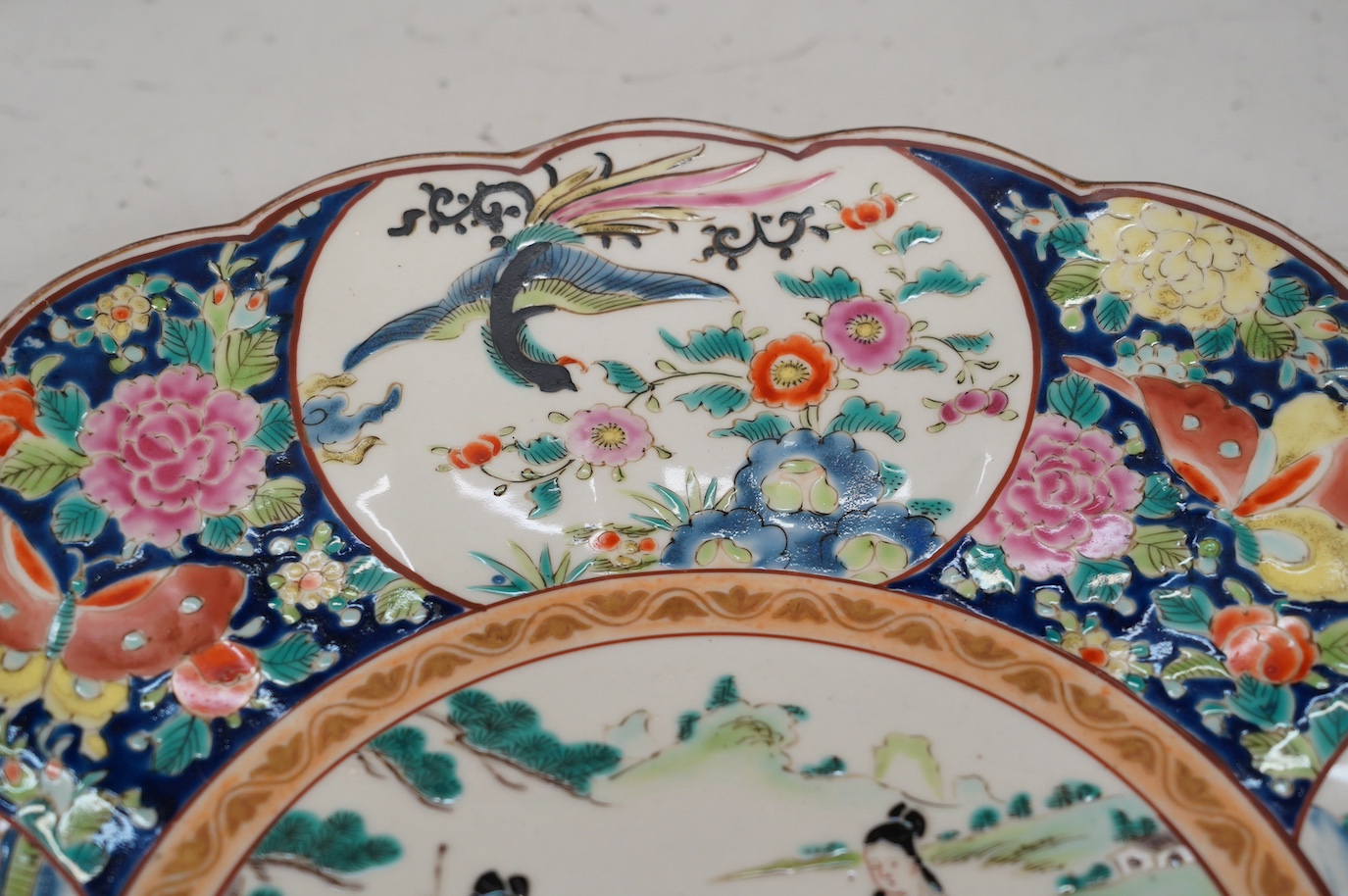 A Japanese famille rose charger, 40cm diameter. Condition - good, some wear